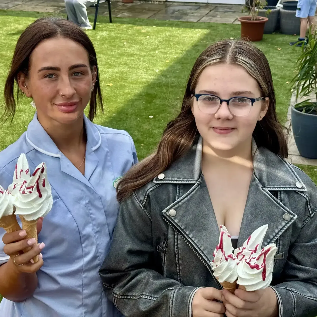Shez Whippy serving ice cream on Holly Bank Nursing Home Community event in Radcliffe