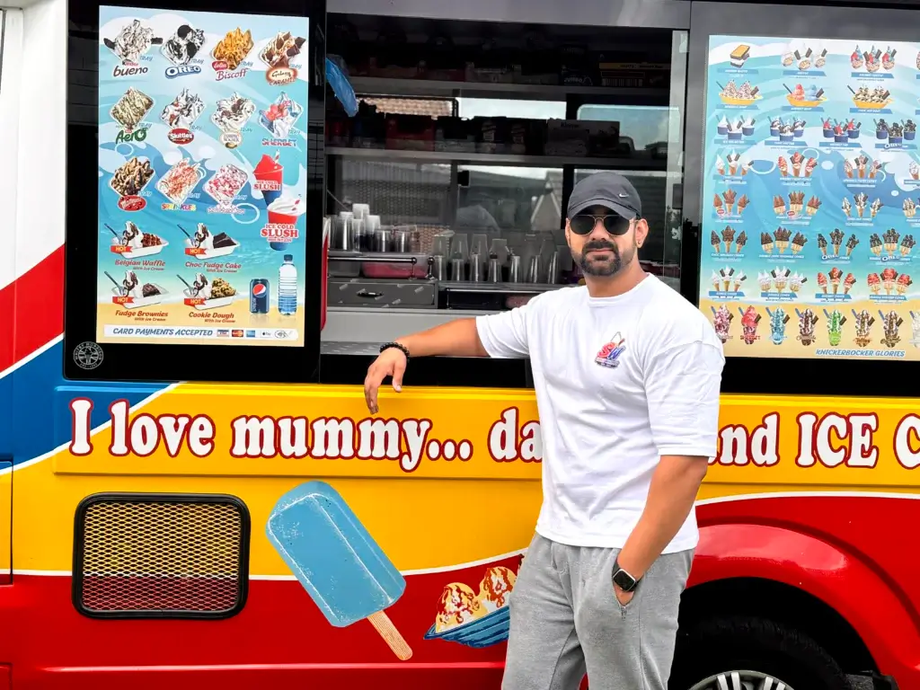 Shez Whippy Founder leaning on Shez Whippy Ice Cream van hire Greater Manchester