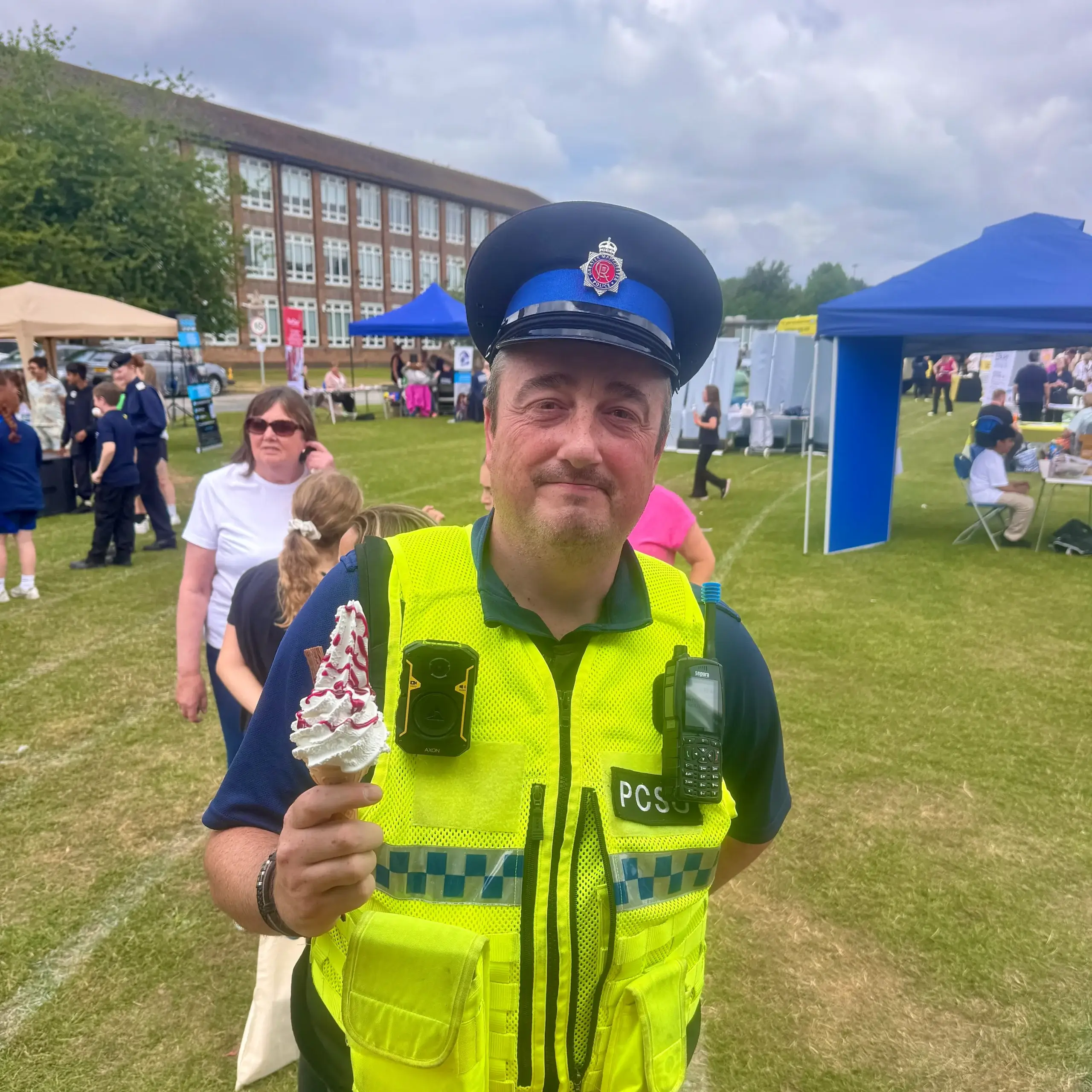 Police Officer enjoying Shez Whippy Ice Cream on a community event in Bury, Greater Manchester