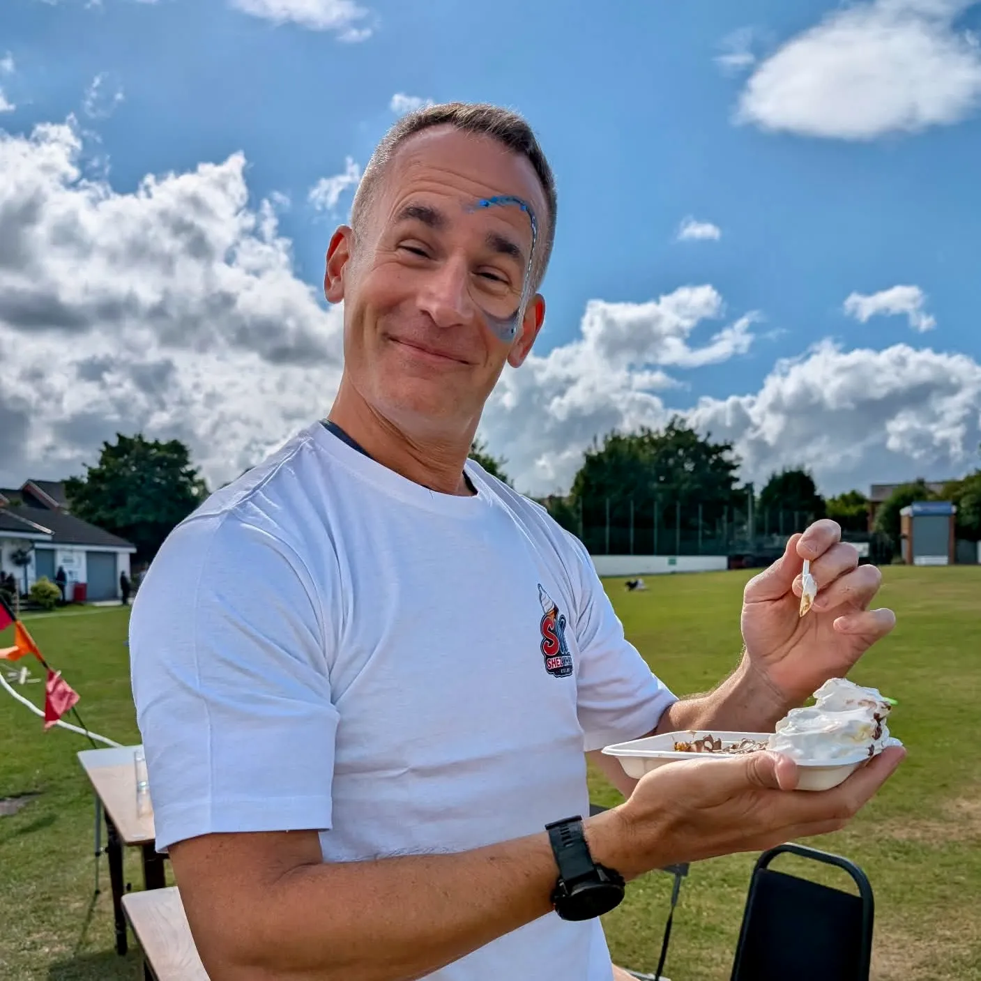 customer enjoying Shez Whippy ice cream on family fun day private event in Bury
